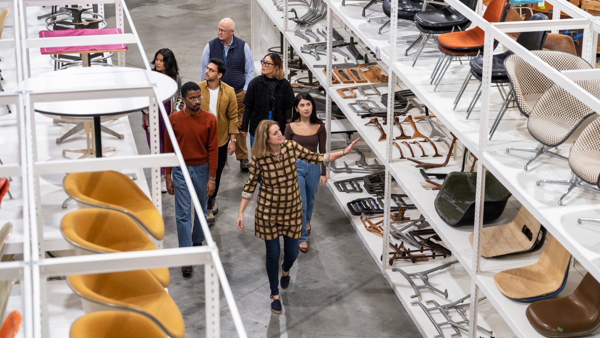 The Eames Institute’s chief curator, Llisa Demetrios takes guests on a tour including many designs by the Eameses.